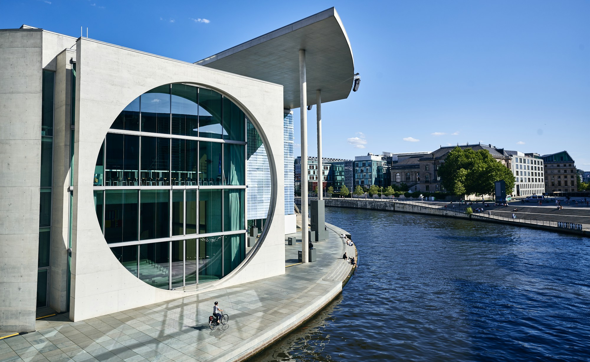 Modern glass and concrete architecture beside the water in Berlin